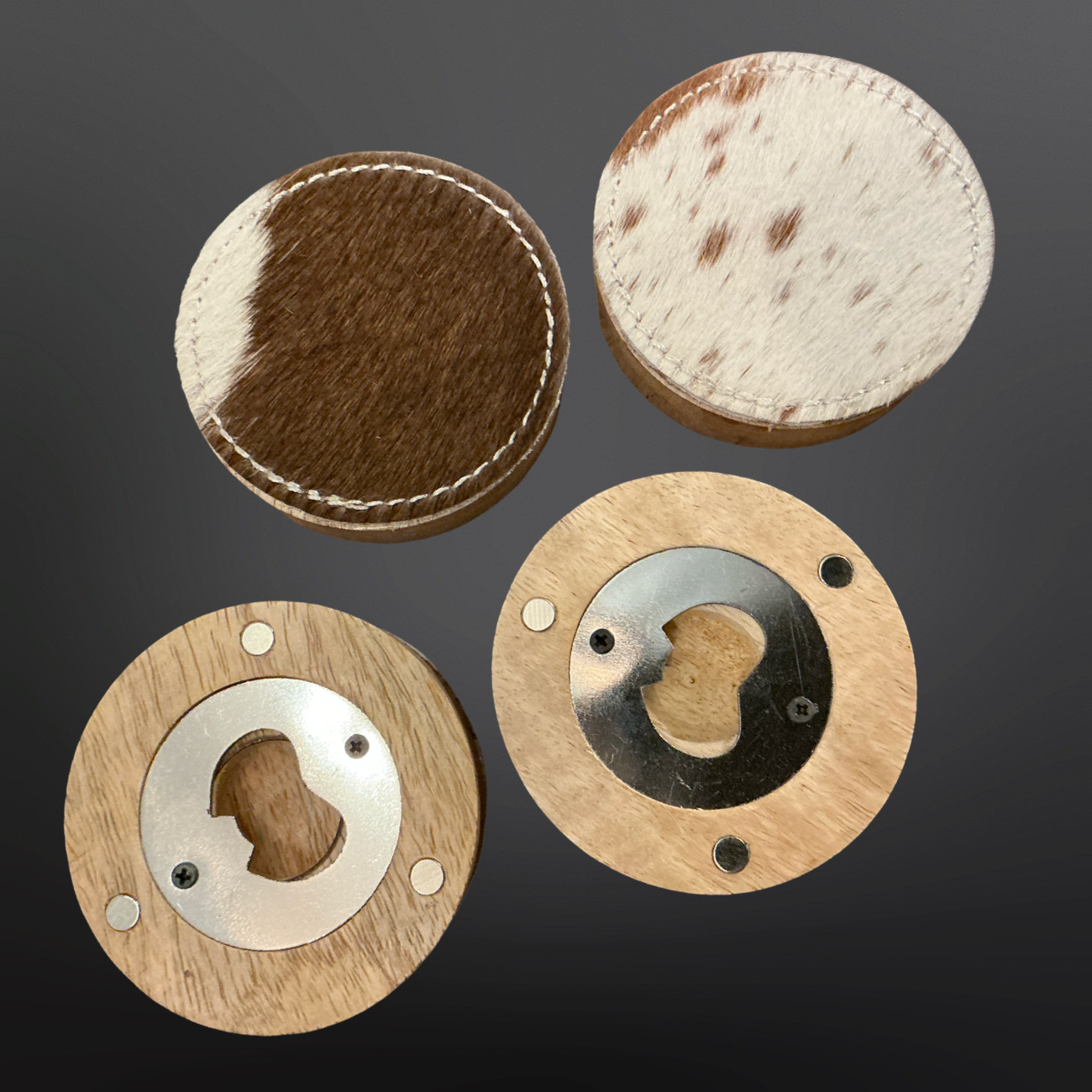 Four circular wooden and leather accessory pieces arranged on a dark gray background, including two round pieces with brown and white cowhide-like sections and two round metal-and-wood circular components.
