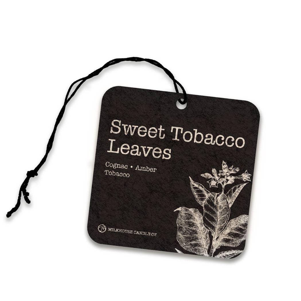 Sweet Tobacco Leaves air freshener with black background and white text