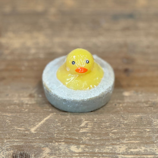 yellow rubber ducky in round shaped soap