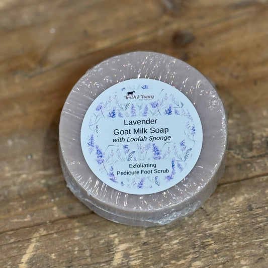 Round light purple soap with a lavender flower printed label