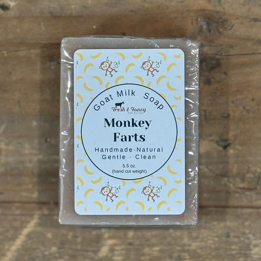 Natural color bar soap with monkeys and bananas pictured on the label