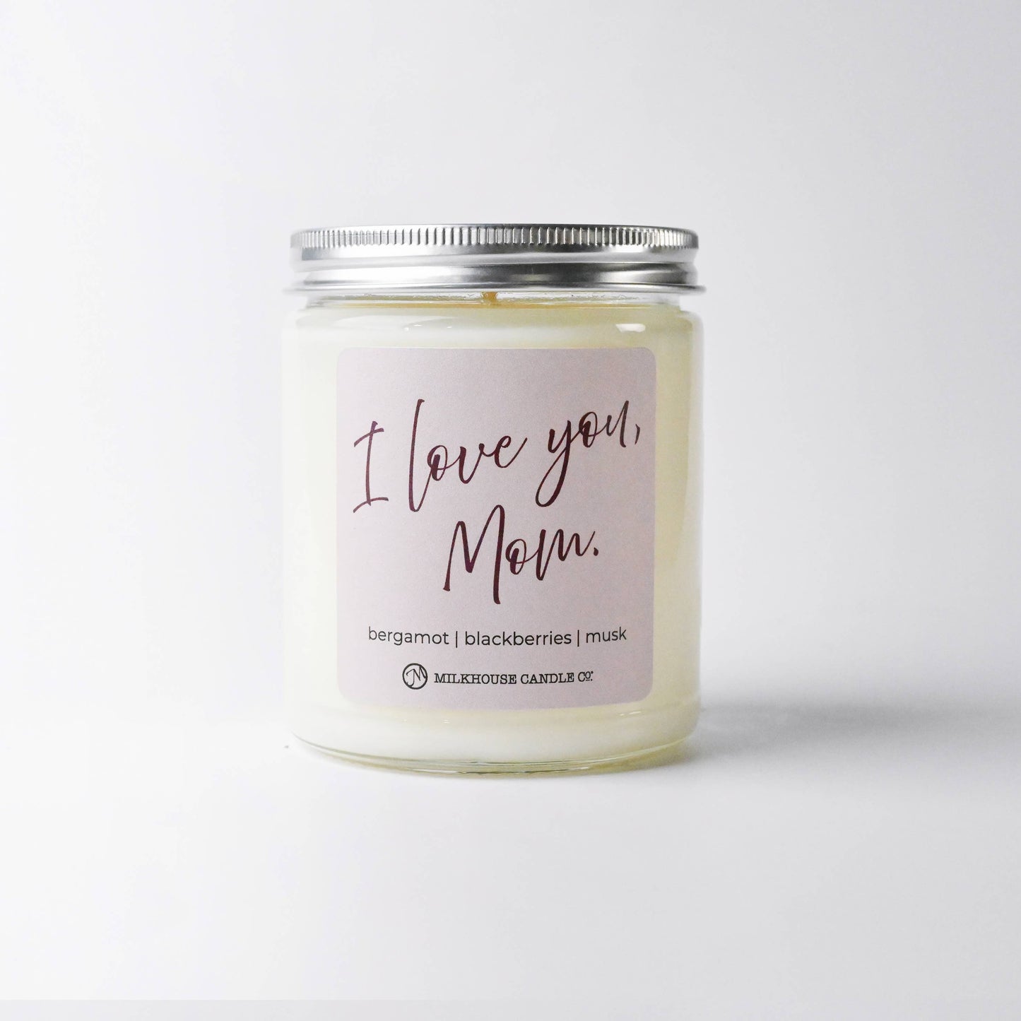 Candle jar with 'I love you Mom' label on a white background