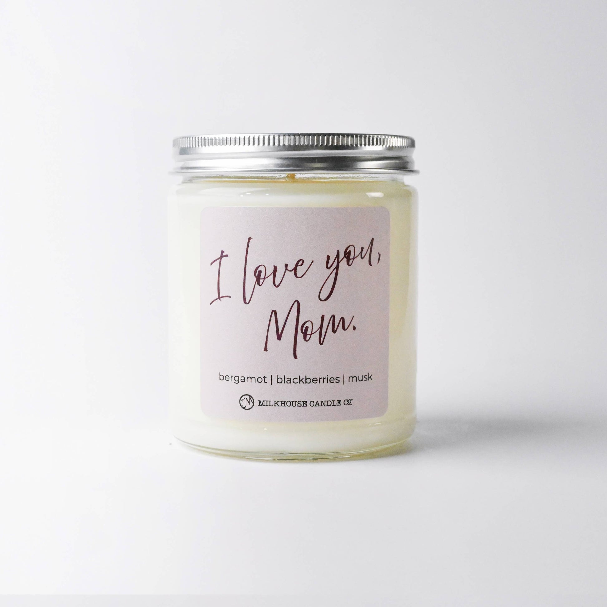Candle jar with 'I love you Mom' label on a white background