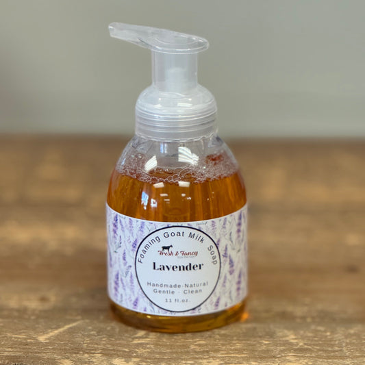 Clear hand pump bottle and white label with lavender all over label